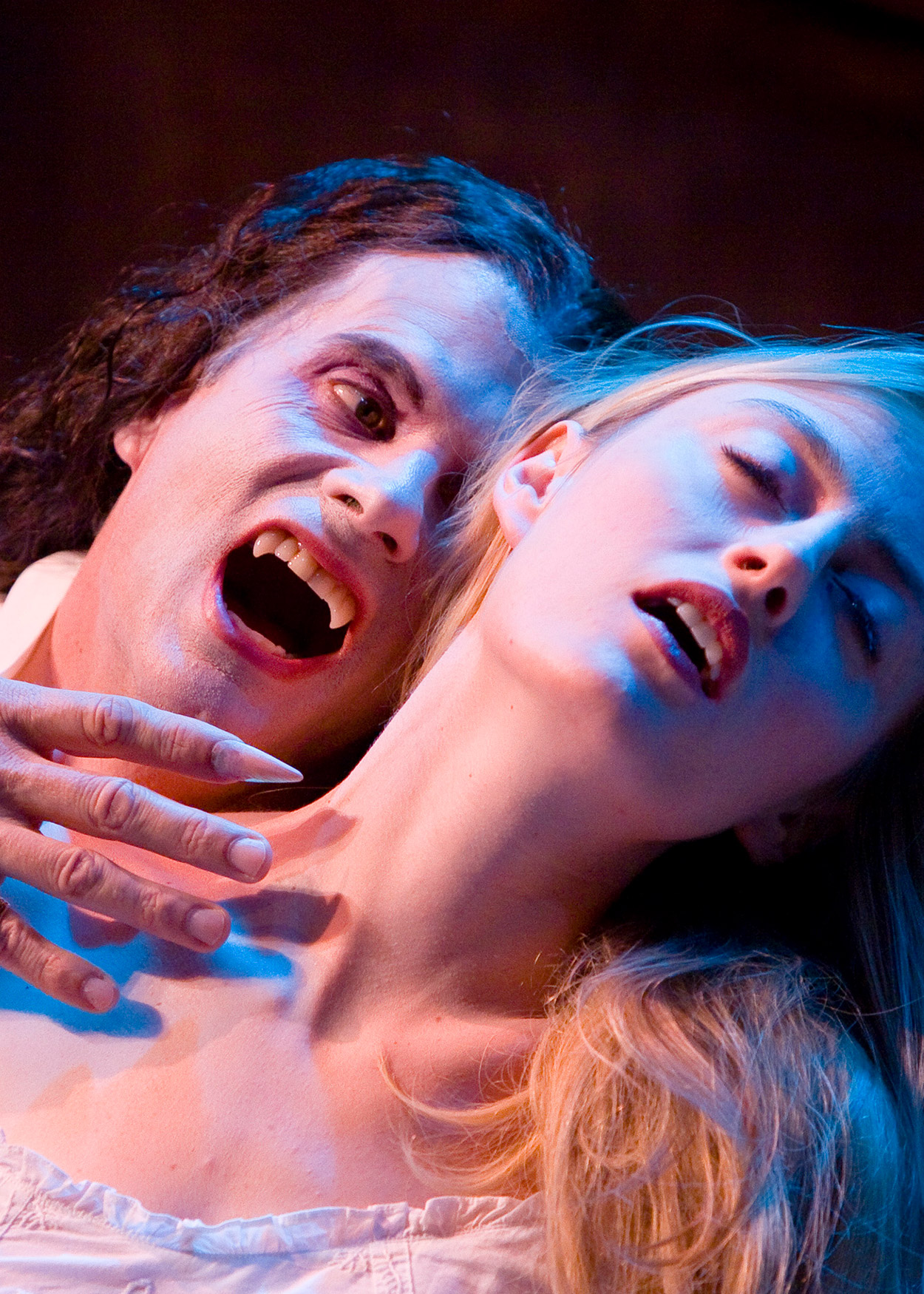 Dracula biting the neck of a woman