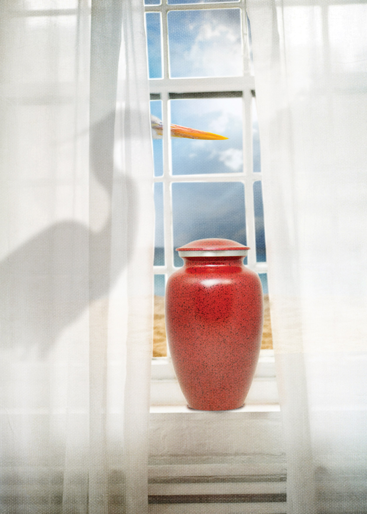 Key Art from The Wake (2019). An image of a large picture window with white sheer curtains. On the window sill is a red urn. Standing behind the curtain is a crane.