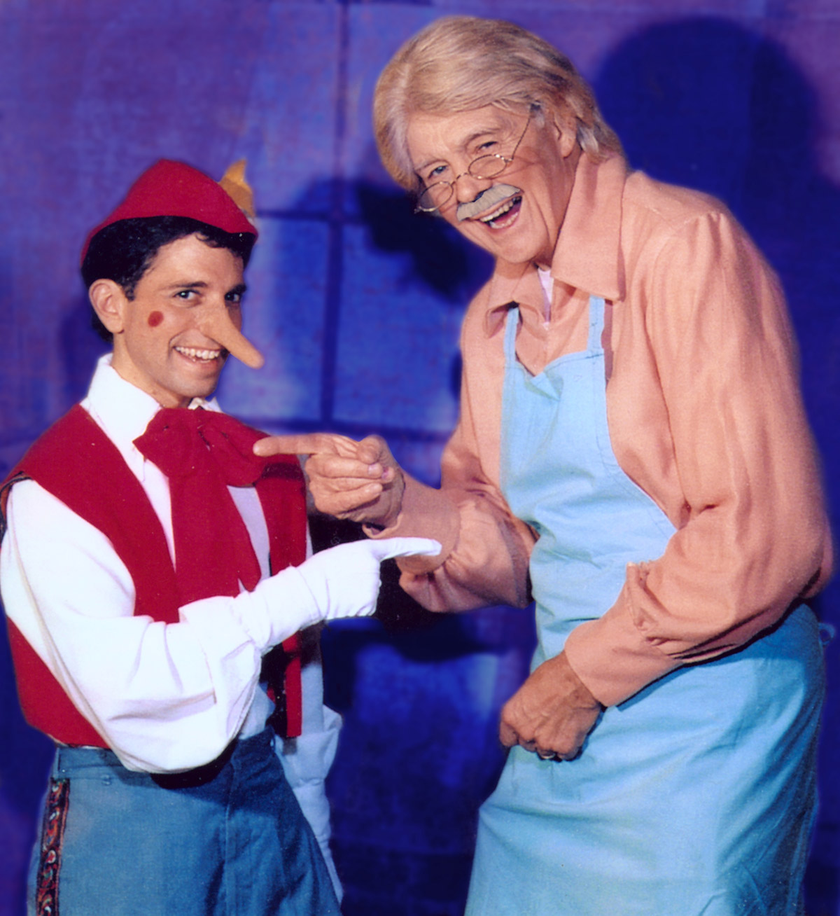 Pinocchio and Geppetto laugh together